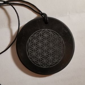 Beautiful black Shungite pendants of flowers